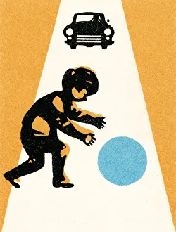 Boy with ball in street; car approaching Boy with ball in street; car approaching
