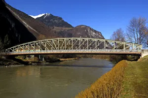 Broadside of a steel bridge crossing Rhone River, near Chessel, Vaud, Switzerland, Europe Broadside of a steel bridge crossing Rhone River, near Chessel, Vaud, Switzerland, Europe