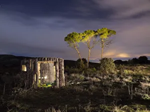 Cabin or hunters refuge of wood in the night Cabin or hunters refuge of wood in the night