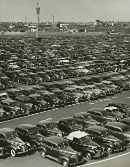 Cars in rows on parking lot, (B&W), (Elevated view) Cars in rows on parking lot, (B&W), (Elevated view)