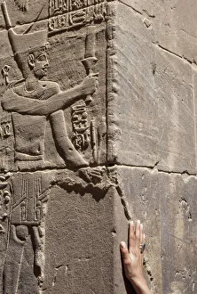 carving of figure and hand at the Temple of Philae carving of figure and hand at the Temple of Philae