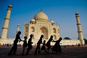 Children are playing in front of Taj Mahal Children are playing in front of Taj Mahal