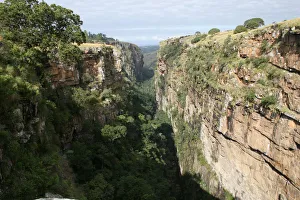 cliffs, day, green vegetation, landscape, mountain, nature, non-urban scene, one person cliffs, day, green vegetation, landscape, mountain, nature, non-urban scene, one person