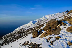 Climbers Pass Glaciers on Their Way to Uhuru Peak Climbers Pass Glaciers on Their Way to Uhuru Peak