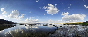 Cloudy sky reflected in the water of the Sees Mono Lake, Mono Lake, Lee Vining, California, United States Cloudy sky reflected in the water of the Sees Mono Lake, Mono Lake, Lee Vining, California, United States