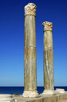 Columns with Corinthian capital in Roman theatre near the Mediterranean sea Leptis Magna Columns with Corinthian capital in Roman theatre near the Mediterranean sea Leptis Magna