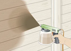 Digital illustration of using spray gun to carefully apply creosote on to garden fence Digital illustration of using spray gun to carefully apply creosote on to garden fence