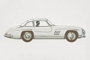 Driver in grey coupe sports car, side view Driver in grey coupe sports car, side view