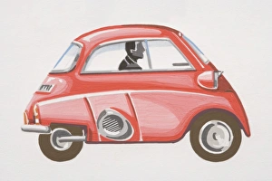 Driver in small red car with bubble top, side view Driver in small red car with bubble top, side view