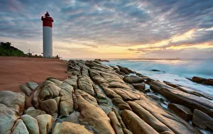 An early morning picturesque stratocumulus sky of the iconic Umhlanga Rocks Lighthouse An early morning picturesque stratocumulus sky of the iconic Umhlanga Rocks Lighthouse