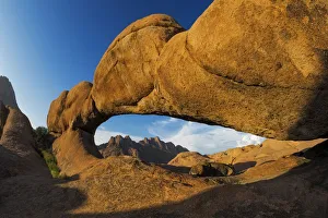 The Eye of Spitzkoppe, the famous Natural Rock Bridge / Arch at Spitzkoppe in the Erongo Region, Namibia, Africa The Eye of Spitzkoppe, the famous Natural Rock Bridge / Arch at Spitzkoppe in the Erongo Region, Namibia, Africa