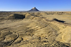 Factory Butte in the bentonite hills of Caineville desert, Utah, USA, North America Factory Butte in the bentonite hills of Caineville desert, Utah, USA, North America