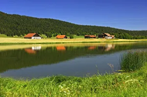 Farmhouses in the Les Tallieres settlement at the Lac des Tailleres, Vallee de la Brevine, high valley Farmhouses in the Les Tallieres settlement at the Lac des Tailleres, Vallee de la Brevine, high valley