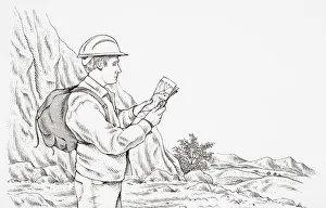 Geologist wearing hard hat, carrying rucksack, looking at a map Geologist wearing hard hat, carrying rucksack, looking at a map