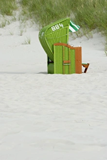 Green beach chair, Nebel, Amrum, North Frisian Islands, Schleswig-Holstein, Germany Green beach chair, Nebel, Amrum, North Frisian Islands, Schleswig-Holstein, Germany