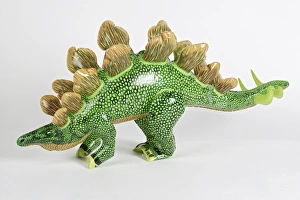Green dinosaur blow up inflatable toy, close up Green dinosaur blow up inflatable toy, close up