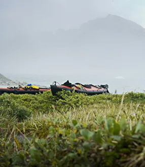 Greenland, Tasiilaq, sea kayaks on misty morning Greenland, Tasiilaq, sea kayaks on misty morning