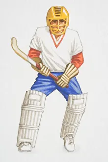 Hockey player wearing helmet and knee pads holding a hockey stick, front view Hockey player wearing helmet and knee pads holding a hockey stick, front view