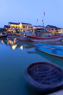 Hoi An River with the famous colorful buildings by night Hoi An River with the famous colorful buildings by night