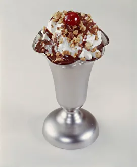 Ice cream sundae on white background, close-up Ice cream sundae on white background, close-up
