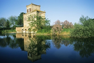 Italy, Emilia Romagna, Delta Del Po Park, Building by pond Italy, Emilia Romagna, Delta Del Po Park, Building by pond