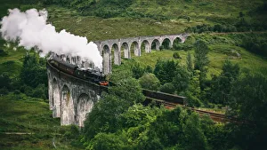 Jacobite Express crossing Glenfinnan Viaduct Jacobite Express crossing Glenfinnan Viaduct