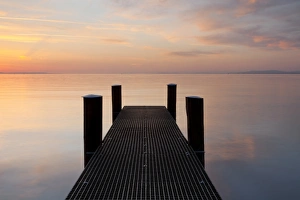Jetty in the evening light overlooking Lake Constance near Bregenz, Rohrspitz, Austria, Europe Jetty in the evening light overlooking Lake Constance near Bregenz, Rohrspitz, Austria, Europe