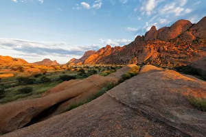 Landscape photo of the Spitzkoppe granite mountains at sunrise. Spitzkoppe, Erongo, Namibia Landscape photo of the Spitzkoppe granite mountains at sunrise. Spitzkoppe, Erongo, Namibia