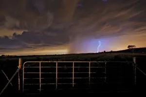 Lightning Strikes at night over a remote farm landscape near Magaliesburg, Gauteng Province, South Africa Lightning Strikes at night over a remote farm landscape near Magaliesburg, Gauteng Province, South Africa