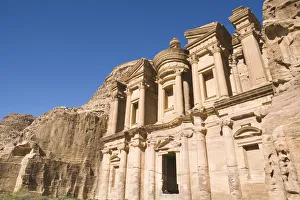 Local Oud player and his friend sit at the entrance to The Monastery, Petra, Jordan Local Oud player and his friend sit at the entrance to The Monastery, Petra, Jordan