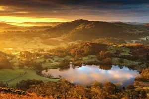Loughrigg Tarn Winter Sunrise, Ambleside, Lake District, UK Loughrigg Tarn Winter Sunrise, Ambleside, Lake District, UK
