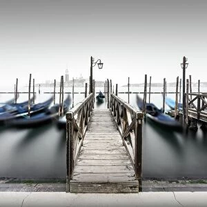 Simplicity in Focus: A Minimal Art Photography Collection: Minimalist long exposure of the gondolas at the Piazzetta near the Campanile at St