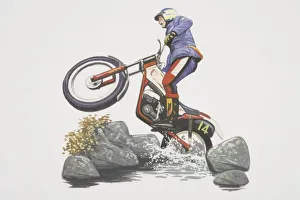 Motorcycle rider performing a wheelie while negociating rocks and water Motorcycle rider performing a wheelie while negociating rocks and water