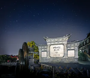 Night view of Old Town Lijiang Gate with star, Yunnan province, China Night view of Old Town Lijiang Gate with star, Yunnan province, China
