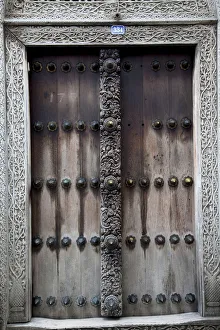 Old traditional wooden door in Stone Town Old traditional wooden door in Stone Town