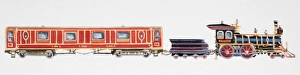 Ornately decorated steam train with black locomotive and a long red carriage, side view Ornately decorated steam train with black locomotive and a long red carriage, side view