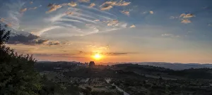 Panoramic photo of the Voortrekker Monument at sunset with a view of the Magaliesburg Mountains in the Background Panoramic photo of the Voortrekker Monument at sunset with a view of the Magaliesburg Mountains in the Background