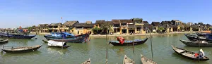 panoramic view of old town and river with boats panoramic view of old town and river with boats