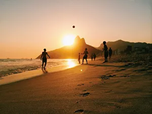 People playing football on Ipanema beach in Rio People playing football on Ipanema beach in Rio