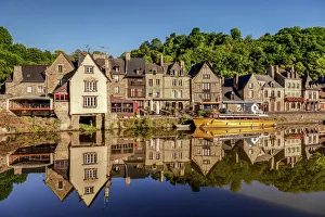 The picturesque medieval port of Dinan, reflected in the smooth Rance, Rance Estuary, Brittany, France The picturesque medieval port of Dinan, reflected in the smooth Rance, Rance Estuary, Brittany, France