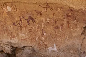 Prehistoric petroglyphs in libian sahara desert Prehistoric petroglyphs in libian sahara desert