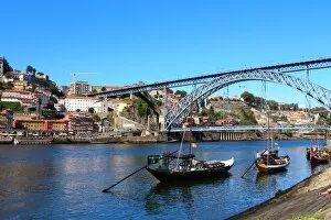 Rail Transportation Collection: Rabelo boats and Dom Luis I bridge in Douro river, Porto