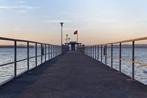 Railing of the ship pier of Mannenbach in the evening light, Lake Constance, Canton of Thurgau, Switzerland Railing of the ship pier of Mannenbach in the evening light, Lake Constance, Canton of Thurgau, Switzerland