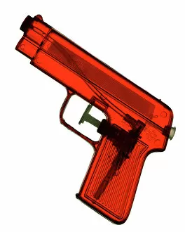 Images Dated 13th September 2014: Red, transparent water gun