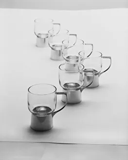 Row of juice extractors against white background Row of juice extractors against white background