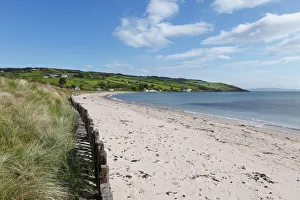 Sandy beach in Cushendun, County Antrim, Northern Ireland, Ireland, Great Britain, Europe Sandy beach in Cushendun, County Antrim, Northern Ireland, Ireland, Great Britain, Europe