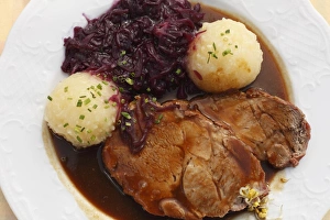 Schweinsbraten, roast pork with dumplings and red cabbage, Upper Bavaria, Bavaria, Germany, Europe Schweinsbraten, roast pork with dumplings and red cabbage, Upper Bavaria, Bavaria, Germany, Europe