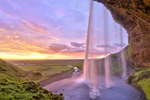 Seljalandsfoss waterfall at sunset, Iceland Seljalandsfoss waterfall at sunset, Iceland