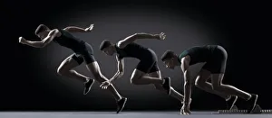 Sequence of male athlete running from starting line Sequence of male athlete running from starting line