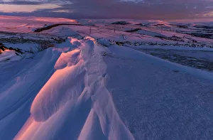 Snow Drifts at sunset in the Peak District National Park, Hayfield, UK Snow Drifts at sunset in the Peak District National Park, Hayfield, UK